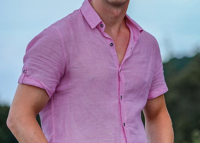 Man standing tall and confident showing good posture